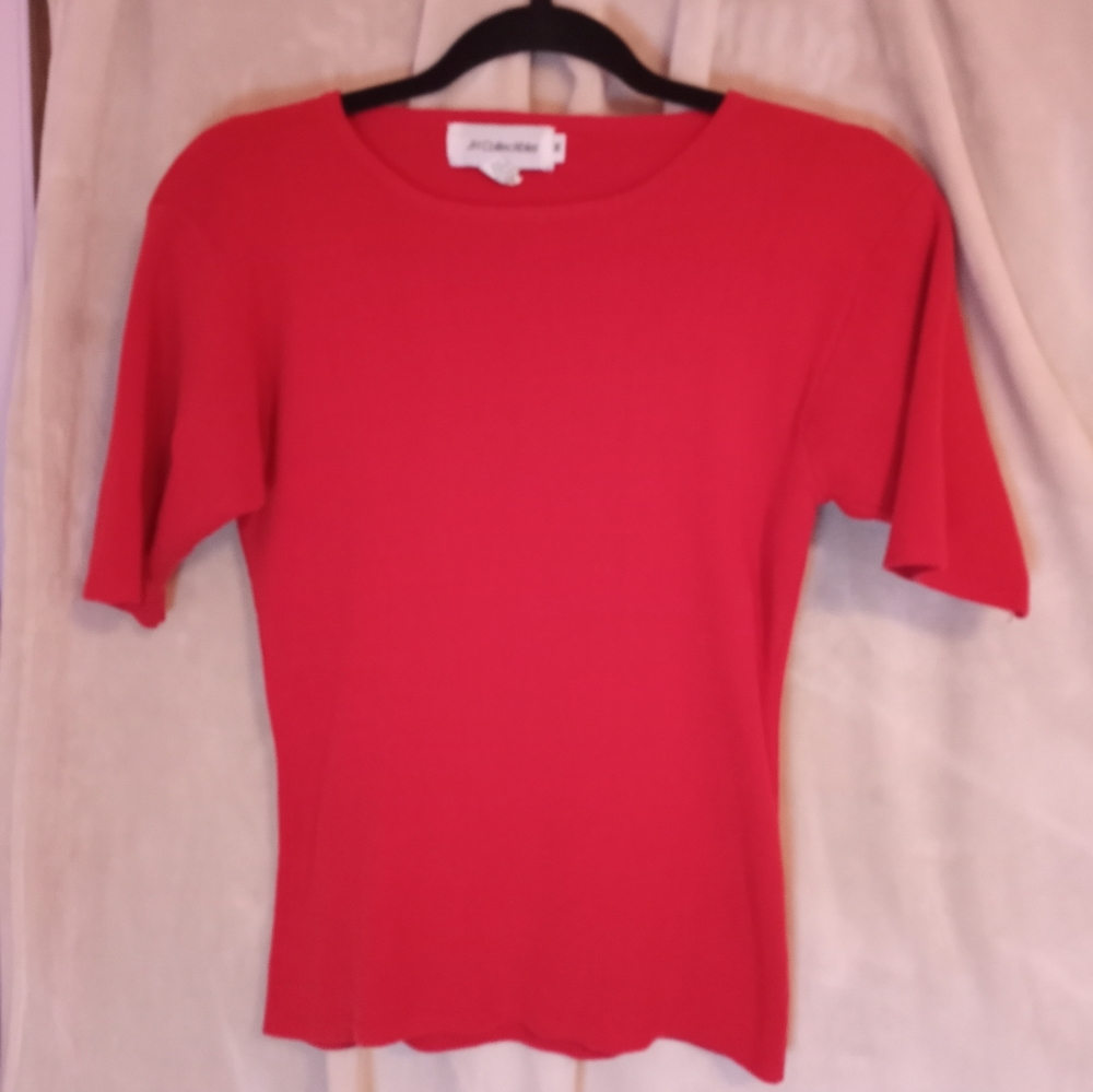 Red short sleeve sweater.